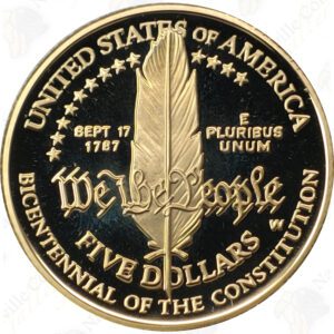 US $5 gold commemorative coin, random design -- .2419 oz pure gold